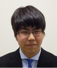西健伸